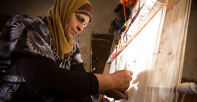 Traditional carpet maker supported by the grantee Society for the Protection of Nature in Lebanon. Photo: UN Women / Joe Saade and Ghinwa Daher